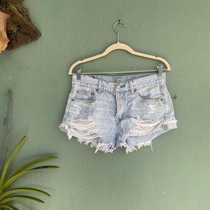 American Eagle highwaisted distressed light wash jean shorts